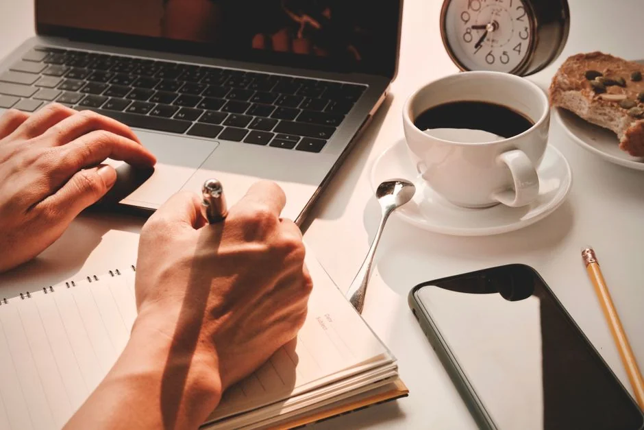 Close-up of a social media marketing document on a desk with a pen and notebook.